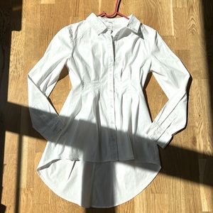 Gorgeous button down blouse with tail